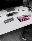 Pink-haired anime girl leaning in with teal eyes and guitar headstock on mouse pad 14x10 inches.