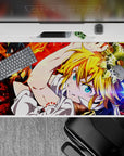40x20 inches anime desk pad with vivid red energy, bright blue eyes, and a fast chaotic hero vibe.