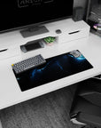 Glowing nebula ribbon with tiny star specks on a space scene mouse pad, 28x12 inches.
