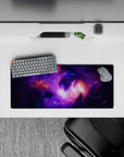 Deep violet and lilac with warm orange nebula glow mouse pad, 28x12 inches, calm late-night space vibe.