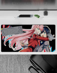 32x16 inches mouse pad with Zero Two design, blending vibrant colors and motion to create a bold, energetic anime-inspired desk effect.