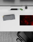 Moody warm wine-red space mouse pad, classic 14x10 inches, deep crimson clouds fading to near-black.