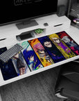 40x20 inches anime desk pad showing seven battle-worn faces with sharp eyes, rugged collars, and crackling color.