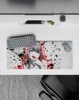 Rebellious 28x12 mouse pad with chaotic splatters, bold contrast, and fierce energy for raw desk aesthetics