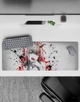 Chaotic 32x12 mouse pad with splattered bold contrasts and raw energy for a rebellious anime look