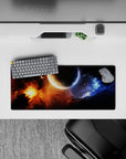 Midnight black mouse pad 28x12 inches with blazing orange nebula and icy blue smoke, calm cosmic mood.