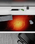 Fiery orange and ember red desk pad 36x16 inches with smoky shadows, warm cozy late-night vibe.