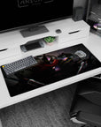 36x16 inches anime desk pad showing a hulking armored knight as a blade-wielding fighter strikes from behind.