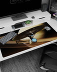 Starship over swirling ringed‑planet bands desk pad 40x20 inches with tiny lights in dark space.