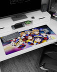 Nico Yazawa and μ's squad smiling in crisp school uniforms on a space backdrop desk pad, 36x16 inches.