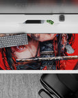 Striking 36x16 inches anime desk pad of a warrior girl with red eyes and a katana, perfect for fans wanting a powerful workspace.