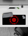 28x12 inches mouse pad with the Sharingan, featuring its iconic evolution in red and black, ideal for Naruto fans.
