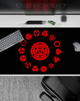 40x20 inches desk pad with the Sharingan, capturing its intense beauty and evolution in red and black, ideal for fans of Naruto.