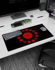 Modern 32x16 inches mouse pad with the Sharingan, showcasing its iconic red and black evolution, perfect for adding power to your desk.