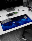 Half-lit moon and starry sky desk pad 36x16 inches, with swirling sapphire clouds across the surface.