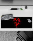 Anime mouse pad 32x12 inches featuring Uchiha clan crest from Naruto, red-on-black design, bold and dramatic.
