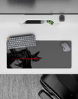 Compact 28x12 mouse pad highlights jagged armor and crimson flow for immersive anime-inspired vibes