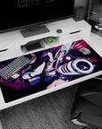 40x20 inches desk pad showing an anime girl mid-lunge, twin tails flying, cannon blasting through neon lines.