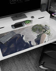 Cool anime girl desk pad 40x20 inches, leaning back with side glance, messy green bun, dark sleeveless top.