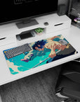 Inosuke Hashibira from Demon Slayer charges forward on a 32x16 inch anime mouse pad, showcasing bold colors and dynamic motion.