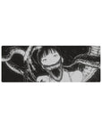 Anime girl mouse pad 32x12 inches with ink-black shadow tendrils and sharp-toothed grin line art.
