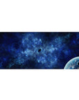 Deep-space nebula desk pad 36x16 inches with cloudy swirls and a distant planet corner detail.