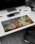 Large 32x16 inch mouse pad with dreamy nebula design in teal, gold, and white tones for a stylish workspace.