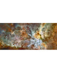 Cosmic-themed desk pad 36x16 inches with teal, gold, and white nebula design and soft cloud-like swirl details.