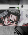 Fury of Eren Yeager 40x20 desk pad with his fierce gaze, battle-scarred face, and smoky battlefield for a dramatic anime look