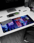 Silver-haired anime girl leaning close with her cat on a rooftop, city lights behind, desk pad 36x16 inches.