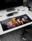 36x16 inches anime girl desk pad showing a four-girl friend group hanging by your keyboard, playful scene.
