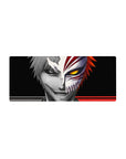Mouse pad featuring Ichigo’s duality, 28x12 inches, with grayscale calm and golden-eyed chaos for an intense Bleach-inspired look.