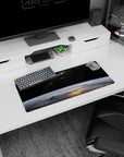Earth curve in deep space mouse pad, 28x12 inches, with dusty galaxy band and scattered stars.