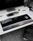 Earth from space scene desk pad 36x16 inches with glowing blue curve, pale clouds, and scattered stars.