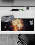 Glowing amber and smoky black mouse pad, 32x12 inches, warm honey-gold clouds in deep night.