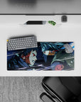 28x12 inches anime mouse pad in icy blues and smoky grays with sharp white streaks, intense vibe.