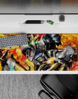 36x16 inches anime desk pad in ember-red and orange explosions with neon green eyes and gritty textures.