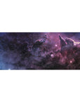 Nebula swirl desk pad 36x16 inches with marbled clouds and star-like twinkles for keyboard and mouse.