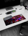 28x12 inches anime mouse pad showing a blade-dancing pink-haired fighter amid swirling smoke, petals, and ash.