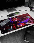 Pink-haired anime swordswoman in a petal-ash storm on a 40x20 inches desk pad, dramatic boss-fight vibe.