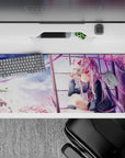 36x16 inches pastel pink sky desk pad with soft clouds, drifting sakura, calm wistful anime vibe.