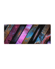 Galaxy shutter-pattern mouse pad, slanted panels over deep space, 28x12 inches.
