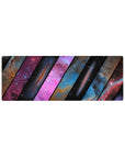 Slanted-panel galaxy desk mouse pad, 32x12 inches, cosmic shutter pattern with starlight.