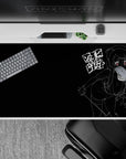 Dark otaku mood desk pad 40x20 inches in deep black with neon red eyes and gritty sketch-style line art.
