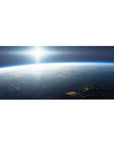 Space sunrise horizon desk pad 36x16 inches with navy cloud shadows and tiny station silhouette.