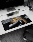 32x16 inches anime mouse pad showing blond hair over gold eyes, scratched face, and steel gun barrel close-up.