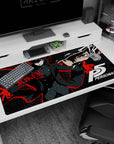 Anime desk pad featuring Joker from Persona 5, 40x20 inches, with red and black geometric design and bold stars.