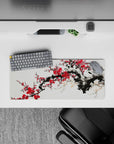 Compact 28x12 desk mat highlights plum blossoms and minimalist strokes for immersive elegance and focus