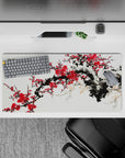 Dynamic 32x16 desk mat combines bold red tones and ink artistry for impactful yet soothing visuals