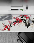 Striking 36x16 desk pad highlights bold red blooms against delicate ink brushstrokes in stunning simplicity